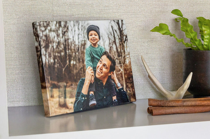 An 8x10" Premium Canvas featuring a wintery image of a man and his son. 