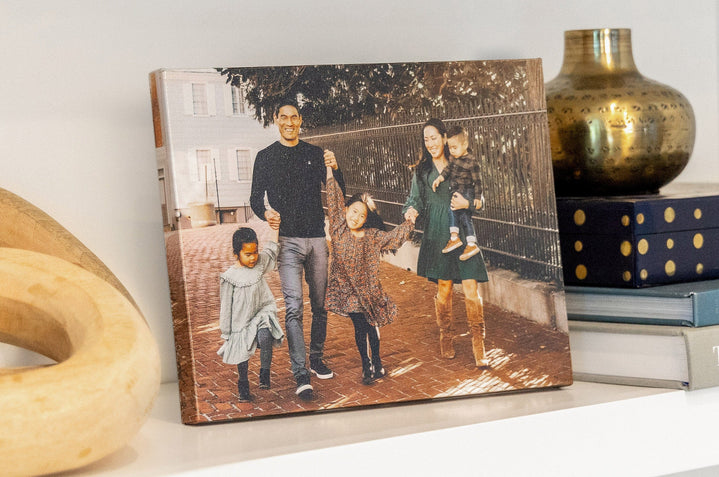 An 8x10" Premium Canvas featuring a autumn al image of a family with three children. 