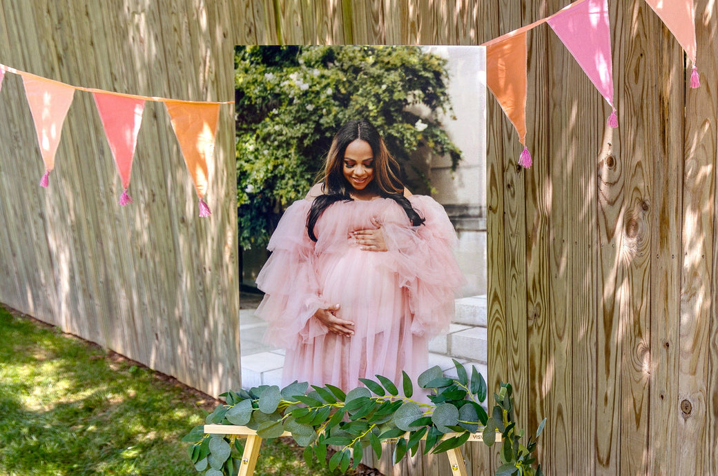 20x30" Photo Print mounted on Styrene set up on an easel outdoors. Print features a maternity photo. 