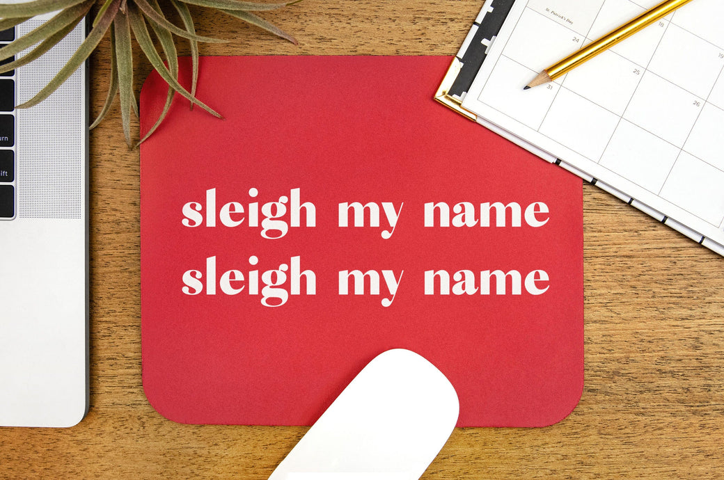 Mouse Pad with a fun Christmas pun written on it. 