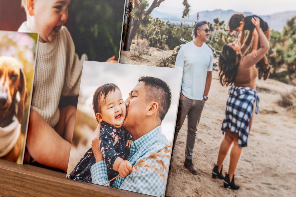 Small Photo Prints mounted on Single Weight Matboard styled on a photo ledge. The focus image is 4x4" and features a father and his baby.