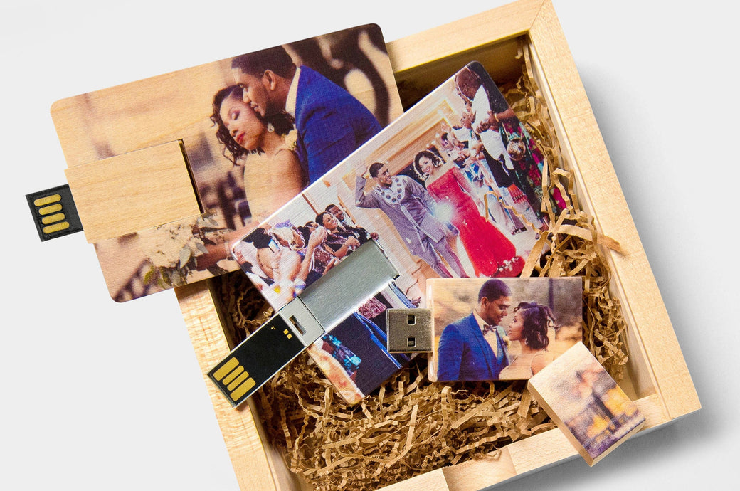  Classic Wood, Contemporary Metal, and Contemporary Wood USB Drives, featuring wedding photos, on a Wood Box